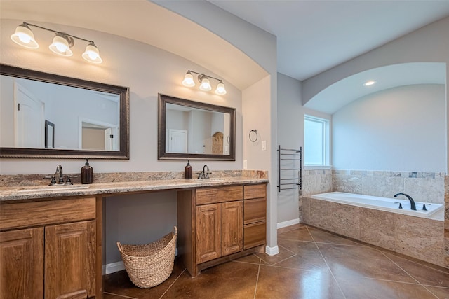 503 Weisinger Dr, Magnolia, TX 77354 - full bathroom with double vanity, a garden tub, tile patterned flooring, and baseboards
