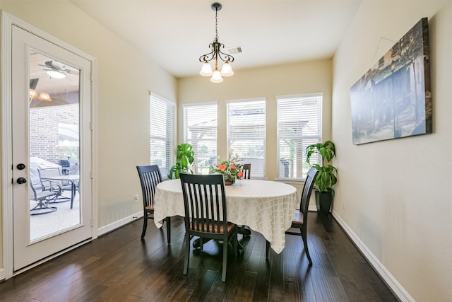 23615 Dolci Ln, Richmond, TX 77406 - dining room with dark wood-type flooring and baseboards