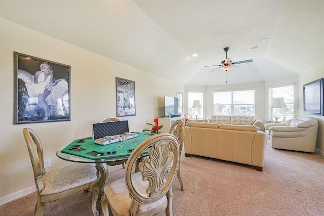 23615 Dolci Ln, Richmond, TX 77406 - dining room with light carpet, a ceiling fan, lofted ceiling, and baseboards