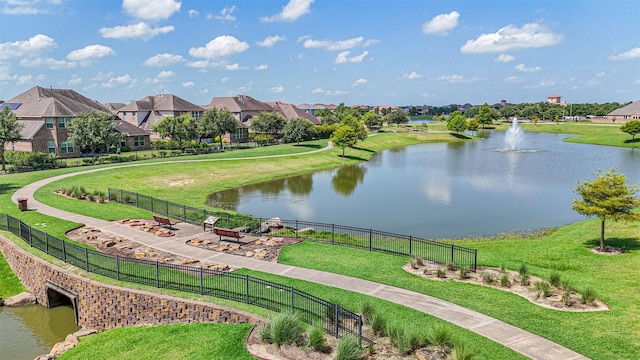 23615 Dolci Ln, Richmond, TX 77406 - view of community with a water view and a residential view
