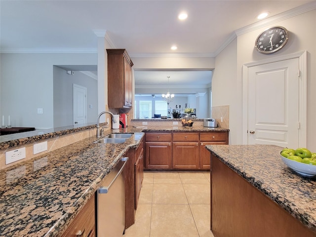 1241 Prince St, Houston, TX 77008 - kitchen with a sink, stainless steel dishwasher, brown cabinets, dark stone countertops, and ornamental molding