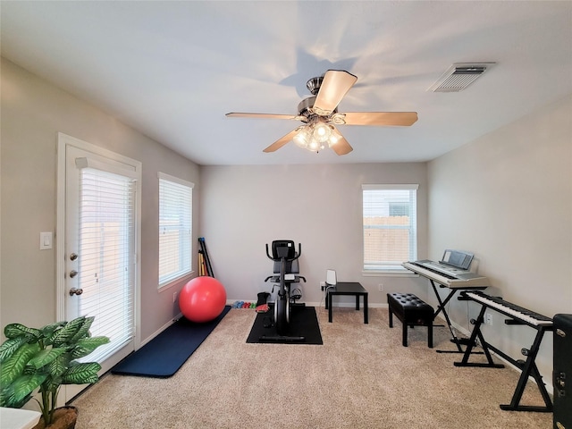 1241 Prince St, Houston, TX 77008 - exercise room featuring carpet, a ceiling fan, and baseboards