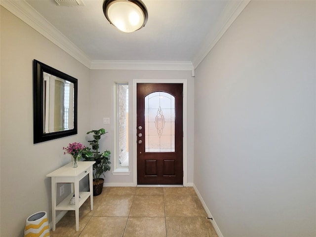 1241 Prince St, Houston, TX 77008 - foyer entrance featuring ornamental molding, light tile patterned floors, and baseboards