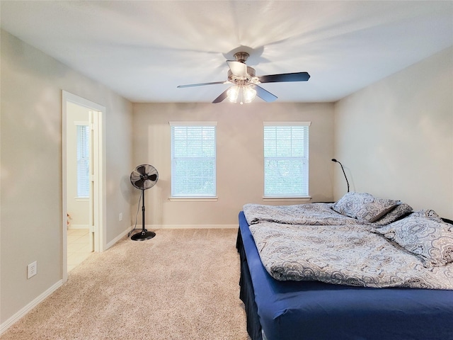 1241 Prince St, Houston, TX 77008 - bedroom featuring carpet flooring, baseboards, ensuite bathroom, and ceiling fan