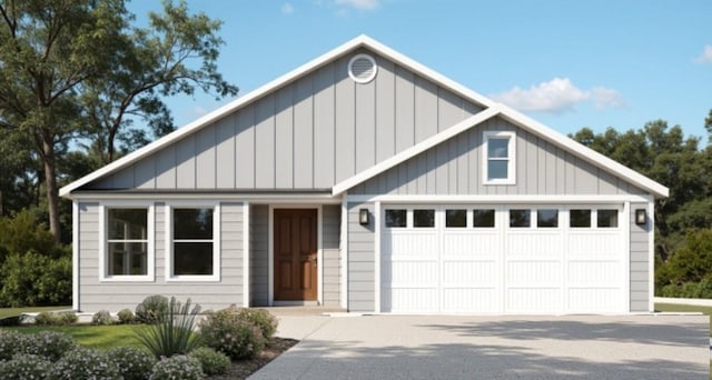 view of front facade featuring concrete driveway, board and batten siding, and an attached garage