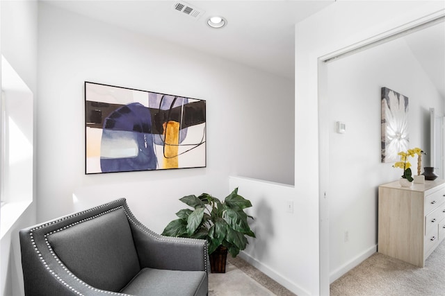sitting room featuring carpet flooring, baseboards, and recessed lighting