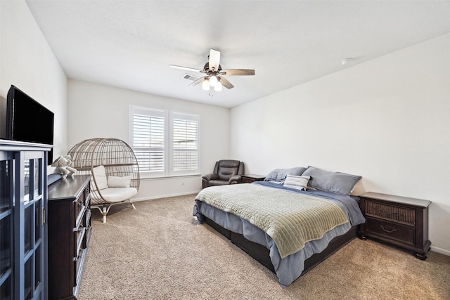 13003 Foxwood Creek Ln, Houston, TX 77044 - carpeted bedroom with baseboards and ceiling fan