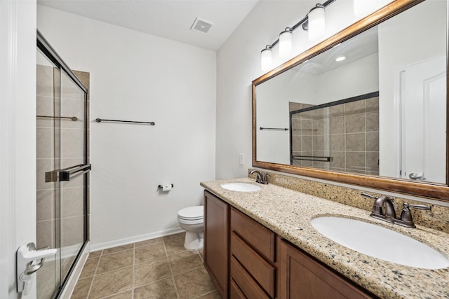 13003 Foxwood Creek Ln, Houston, TX 77044 - bathroom with a shower stall, toilet, baseboards, and double vanity