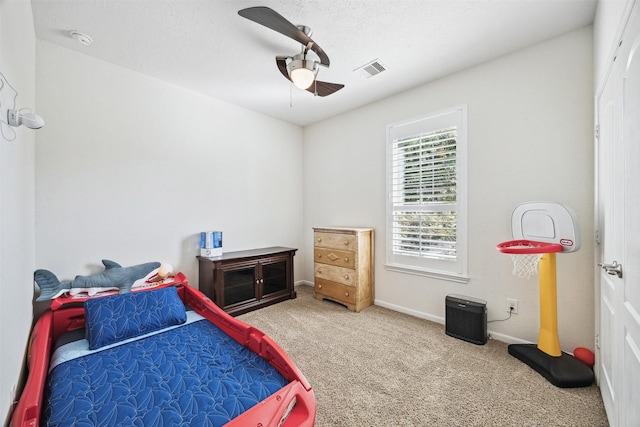 13003 Foxwood Creek Ln, Houston, TX 77044 - bedroom with carpet floors, a ceiling fan, and baseboards