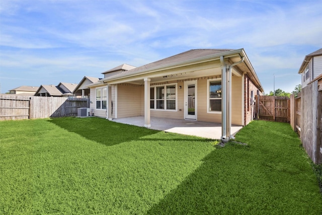 13003 Foxwood Creek Ln, Houston, TX 77044 - back of house featuring cooling unit and a patio