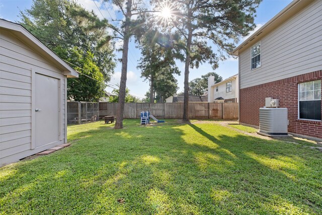 view of yard with central AC