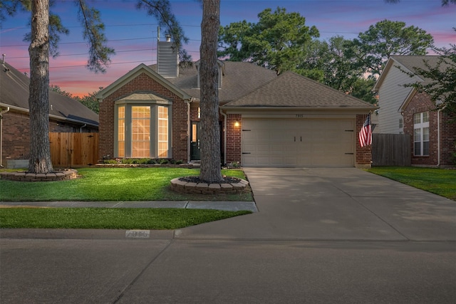 view of front of property featuring a garage, brick siding, concrete driveway, a chimney, and a shingled roof