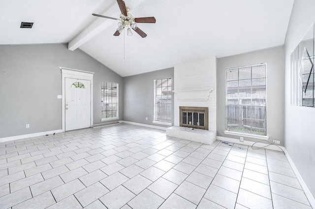 unfurnished living room featuring a ceiling fan, a fireplace, baseboards, and light tile patterned floors