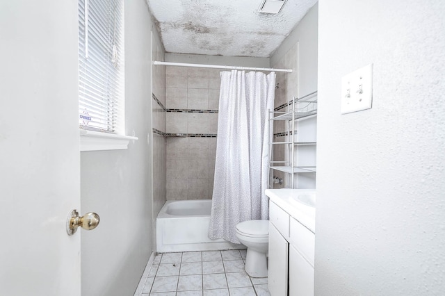 full bathroom with tile patterned floors, toilet, shower / bath combo, and vanity