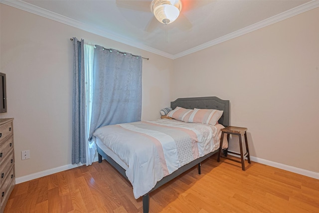 7919 Cabot St, Houston, TX 77078 - bedroom featuring baseboards, light wood-style flooring, ornamental molding, and a ceiling fan