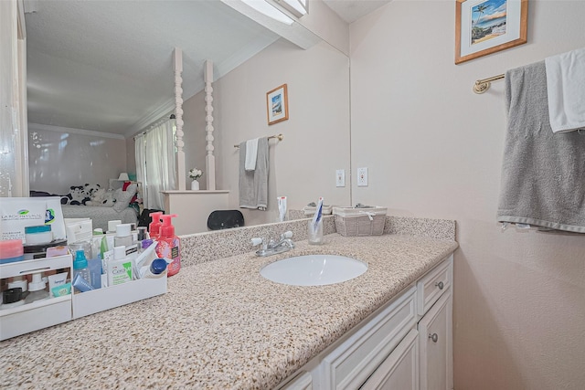 7919 Cabot St, Houston, TX 77078 - bathroom with vanity and crown molding