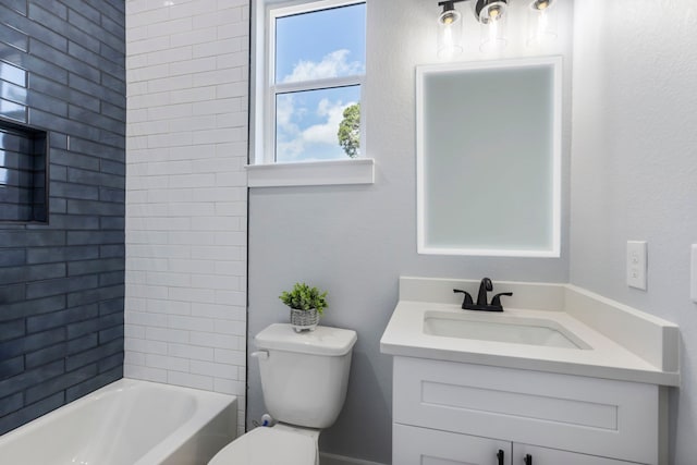 full bath featuring toilet, vanity, and shower / tub combination