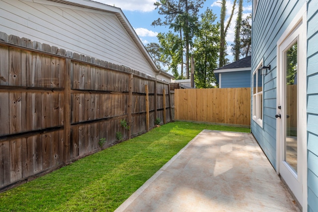 view of yard with a patio area