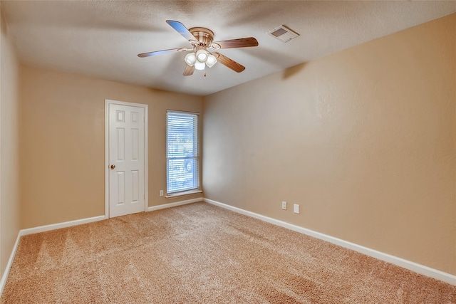 11104 Timber Crest Dr, Houston, TX 77065 - unfurnished room with carpet floors, baseboards, and ceiling fan