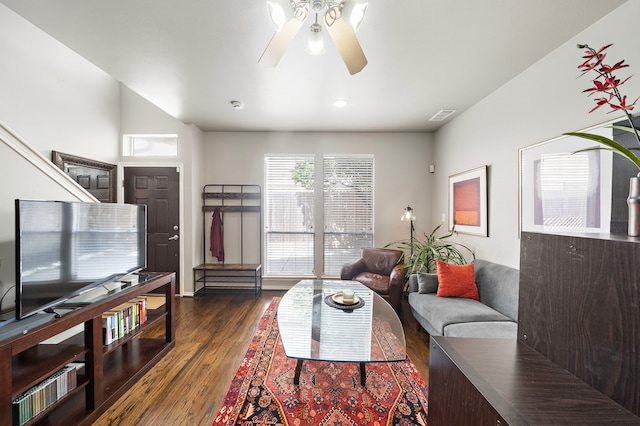 living area featuring ceiling fan and wood finished floors