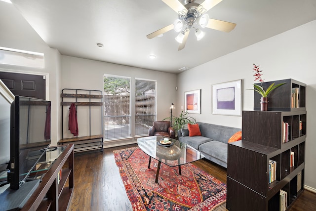living room featuring ceiling fan and wood finished floors