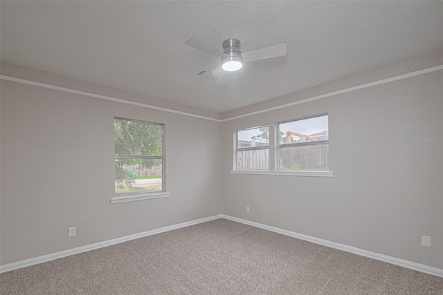 7702 Darnay Dr, Houston, TX 77033 - carpeted empty room featuring healthy amount of natural light, a ceiling fan, and baseboards
