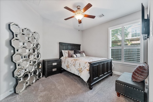 929 Oak St, Houston, TX 77018 - bedroom featuring light carpet, baseboards, and ceiling fan
