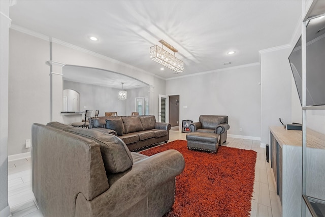 929 Oak St, Houston, TX 77018 - living area featuring arched walkways, recessed lighting, ornamental molding, baseboards, and decorative columns
