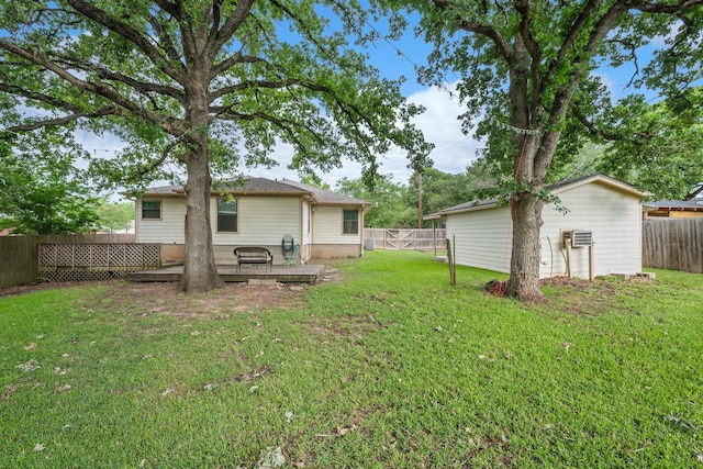 view of yard featuring a wooden deck