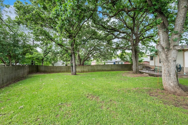 view of yard with a deck