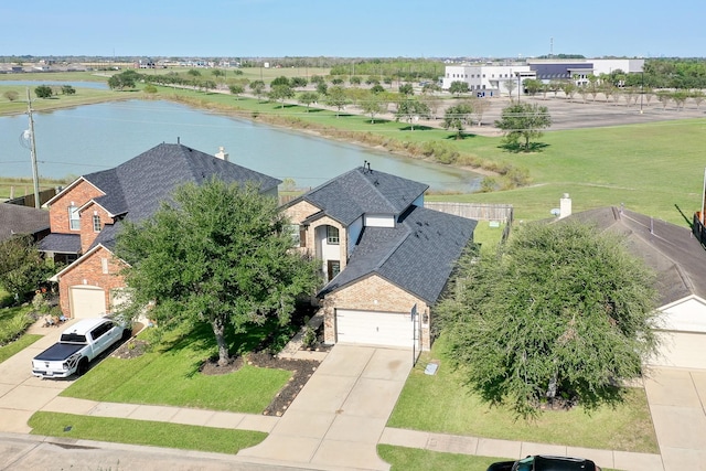 81 San Simeon Dr, Manvel, TX 77578 - aerial view of property and surrounding area featuring a large body of water