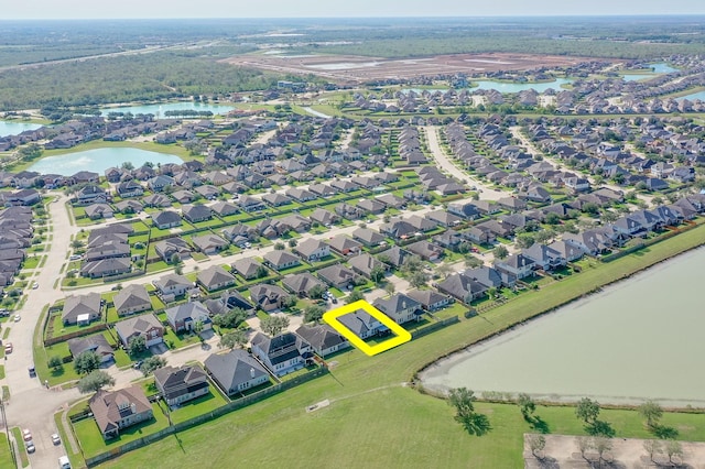 81 San Simeon Dr, Manvel, TX 77578 - aerial view of property and surrounding area featuring a large body of water and nearby suburban area