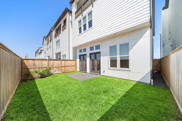 back of property with french doors