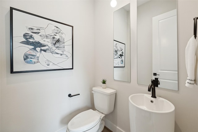 524 Janisch Rd, Houston, TX 77018 - bathroom with baseboards and toilet