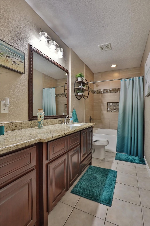 full bathroom with a textured ceiling, tile patterned flooring, toilet, a textured wall, and shower / bath combination with curtain