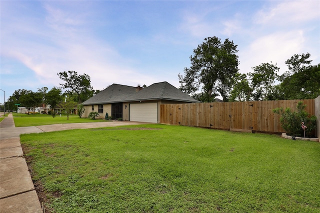 view of front of property with driveway and an attached garage