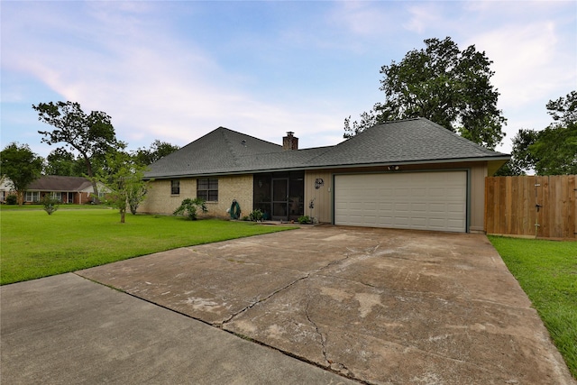 ranch-style home featuring driveway, a garage, a chimney, and roof with shingles
