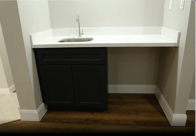 1703 Grand Valley Dr, Houston, TX 77090 - bathroom featuring wood finished floors, baseboards, and vanity