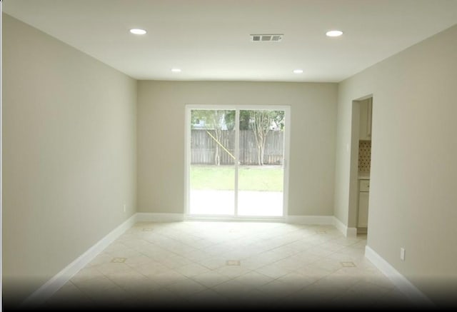 1703 Grand Valley Dr, Houston, TX 77090 - empty room featuring recessed lighting, baseboards, and light tile patterned floors