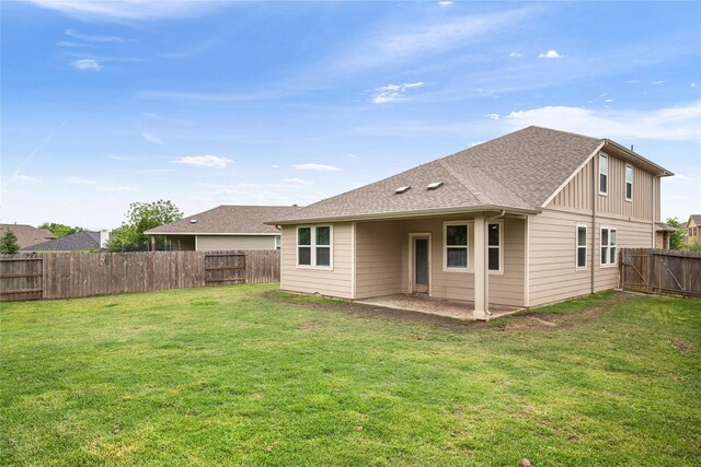 104 Clay Creek Ln, Montgomery, TX 77316 - rear view of house featuring board and batten siding, a patio, and roof with shingles