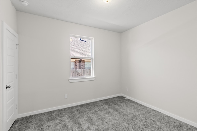3017 Pampaneria Dr, Conroe, TX 77301 - unfurnished room featuring carpet, a smoke detector, and baseboards