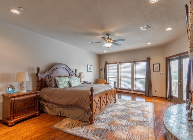 bedroom with access to exterior, light wood finished floors, recessed lighting, ceiling fan, and baseboards