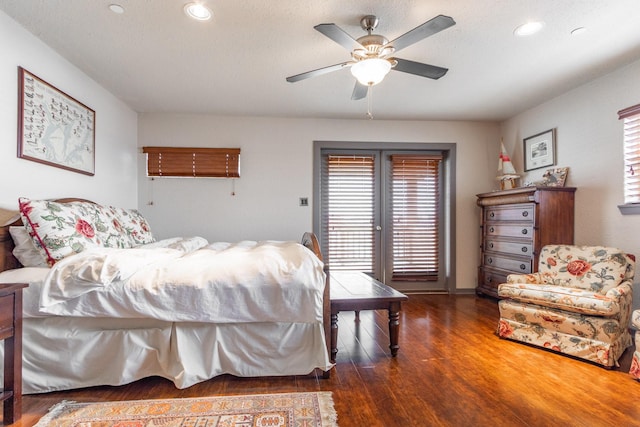 bedroom with wood finished floors, recessed lighting, and a ceiling fan