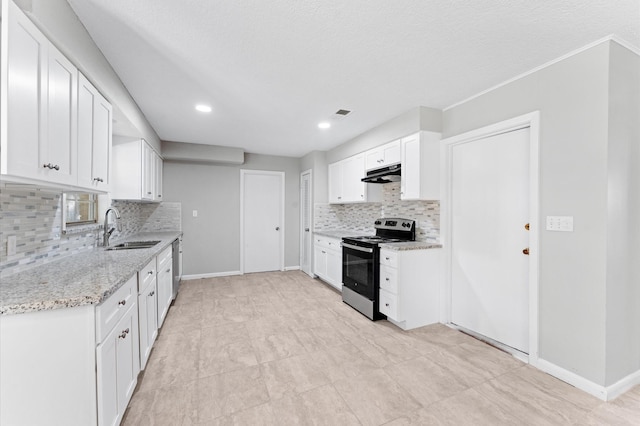 kitchen with appliances with stainless steel finishes, a sink, under cabinet range hood, tasteful backsplash, and white cabinetry