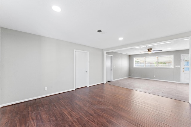 unfurnished room featuring wood finished floors, baseboards, a ceiling fan, and recessed lighting