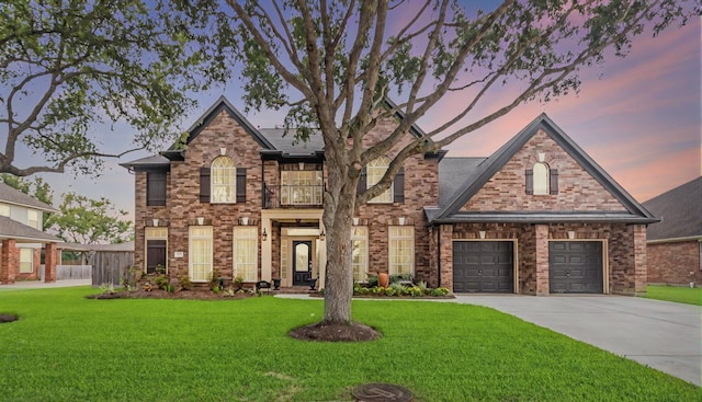 1886 Pampas Trail Dr, Friendswood, TX 77546 - view of front facade with a balcony, driveway, and brick siding