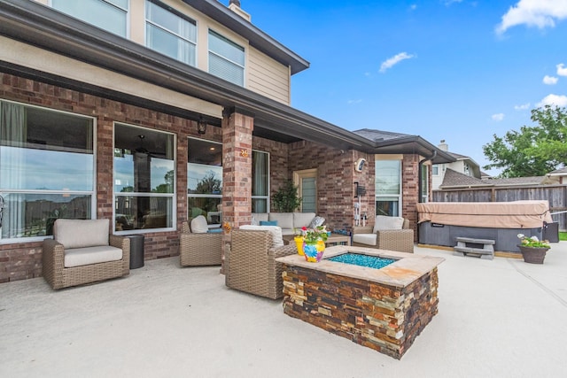 1886 Pampas Trail Dr, Friendswood, TX 77546 - view of patio / terrace with a hot tub and an outdoor living space with a fire pit