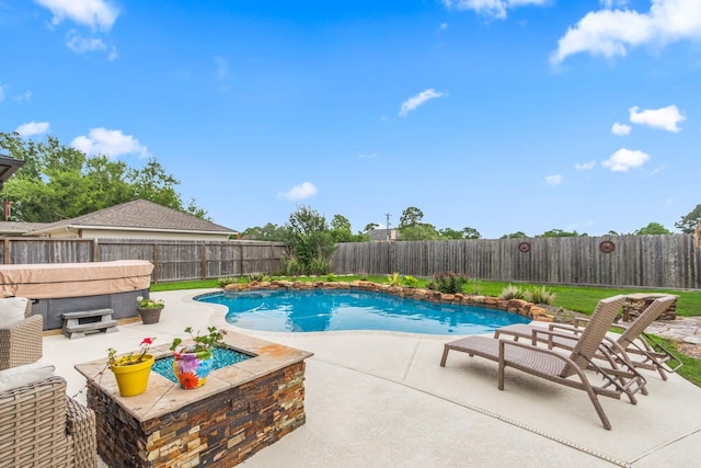 1886 Pampas Trail Dr, Friendswood, TX 77546 - view of pool featuring a hot tub, a patio area, and a fenced backyard