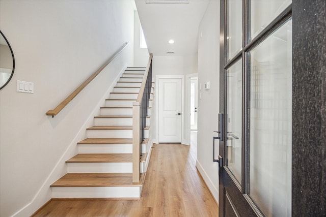 526 Janisch Rd, Houston, TX 77018 - staircase featuring wood finished floors, baseboards, and recessed lighting