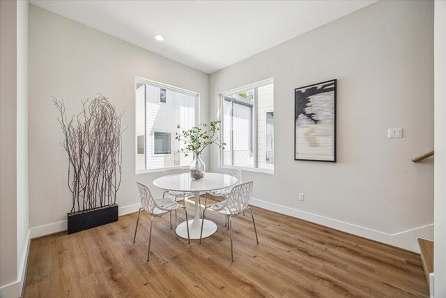 526 Janisch Rd, Houston, TX 77018 - dining area featuring baseboards, wood finished floors, and recessed lighting